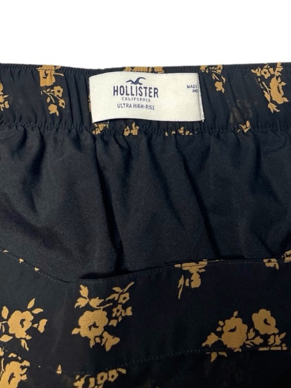 HOLLISTER CO Ultra High-Rise Black Floral Tie-Waist Mini Skirt with Ruffle Hem - Picture 10 of 11